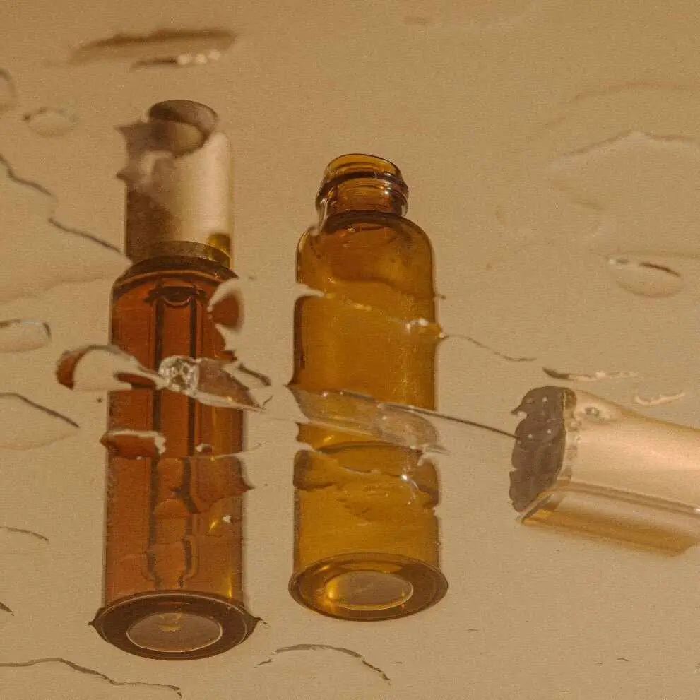 Due bottiglie in vetro ambrato con contagocce per booster viso